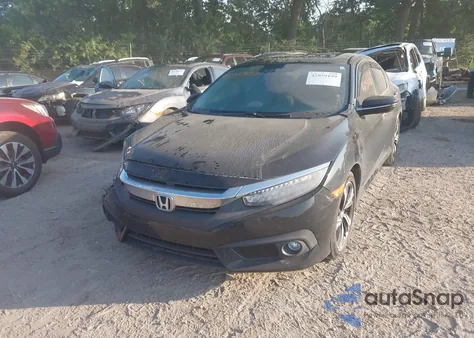 2017 Honda Civic Touring z USA, uszkodzony, nr VIN 19XFC1F95HE010135